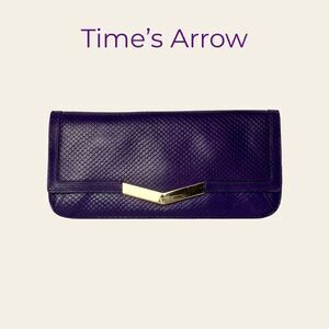 Time’s Arrow Purple Snakeskin Clutch
